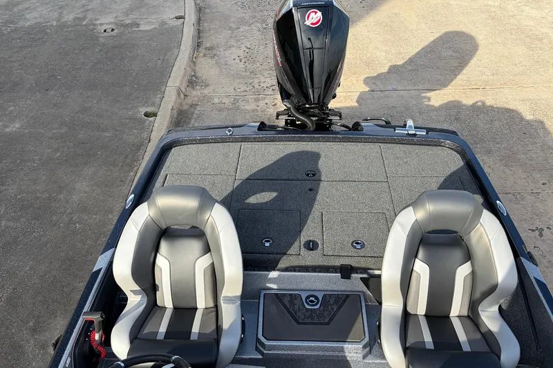 Slide: The Image of 2026 Nitro Z19 XL Pro boat interior with dual seats and Mercury engine. - 46
