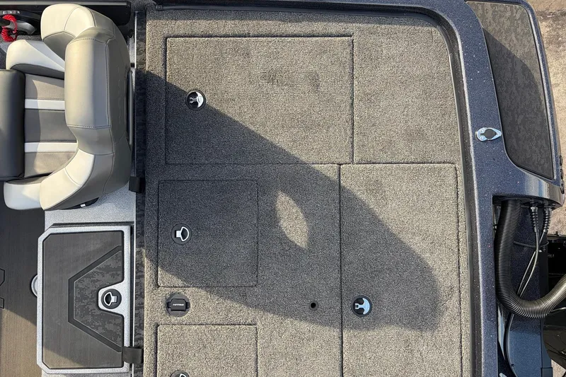 Slide: The Image of 2026 Nitro Z19 XL Pro boat interior with gray seating and storage compartments. - 57