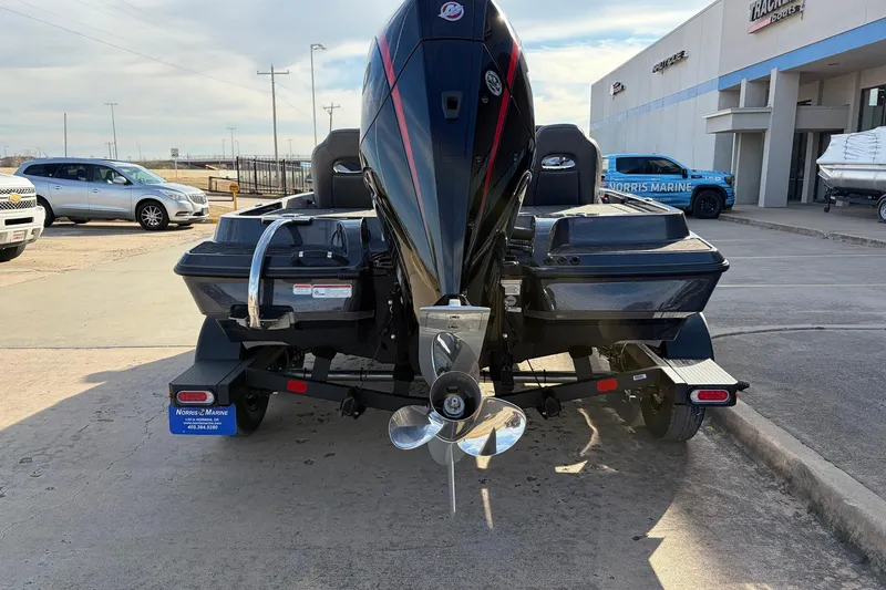 Slide: The Image of 2026 Nitro Z19 XL Pro boat on trailer at dealership parking lot. - 9