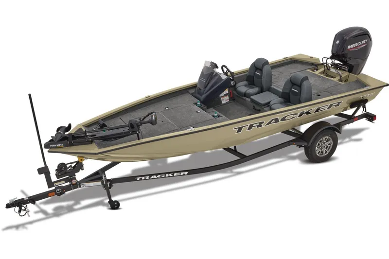 The Image of 2026 Tracker Pro Team 175 boat displayed indoors, featuring comfortable seating and modern design. - 1