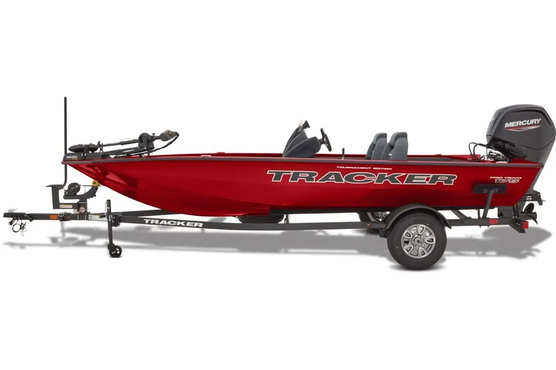 Slide: The Image of Interior of 2026 Tracker Pro Team 175 boat with gray carpet and seating. - 6