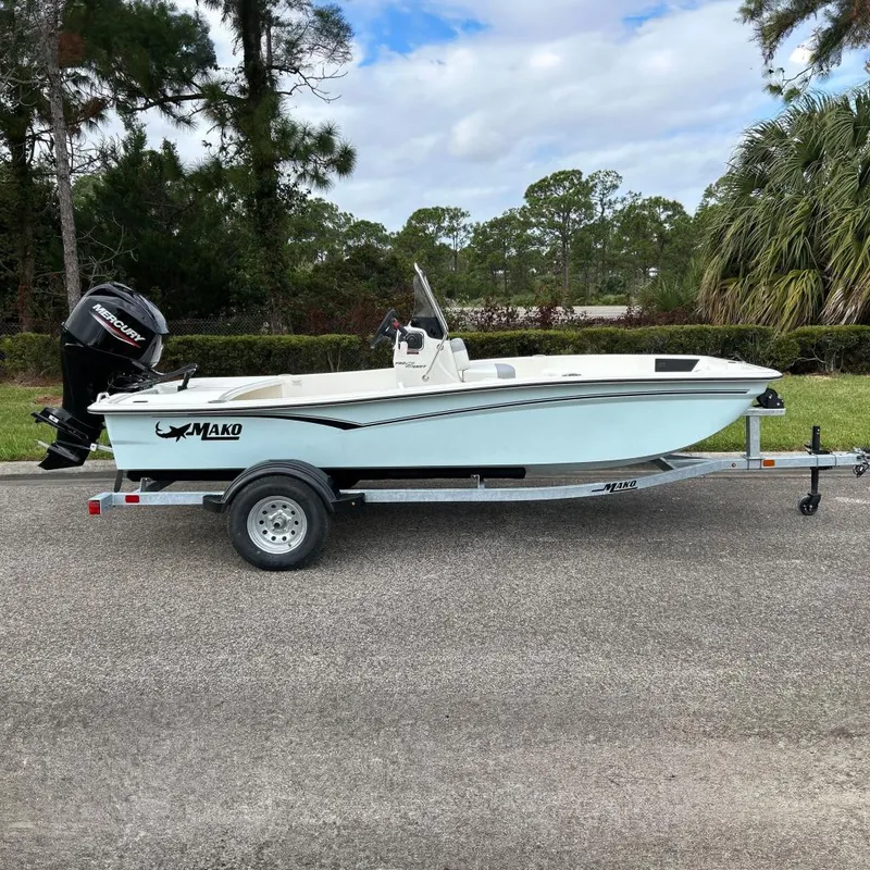 The Image of 2026 Mako Pro Skiff 15 CC on trailer, parked outdoors. - 0