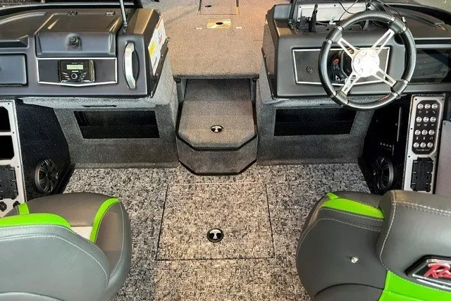 Slide: The Image of 2026 Ranger VX1888 WT boat interior with modern dashboard and seating. - 18