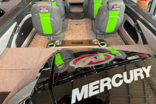 Slide: The Image of 2026 Ranger VX1888 WT boat interior with green-accented seats and Mercury branding. - 10
