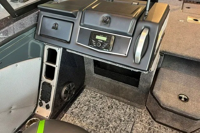 Slide: The Image of Interior of 2026 Ranger VX1888 WT boat with modern dashboard and controls. - 14