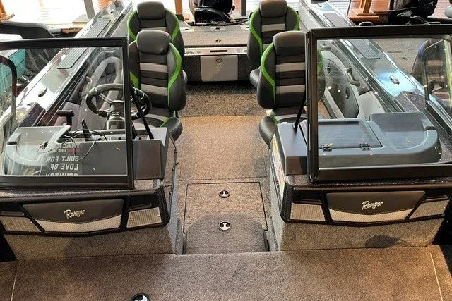Slide: The Image of 2026 Ranger VX1888 WT boat interior with seating and steering console. - 15