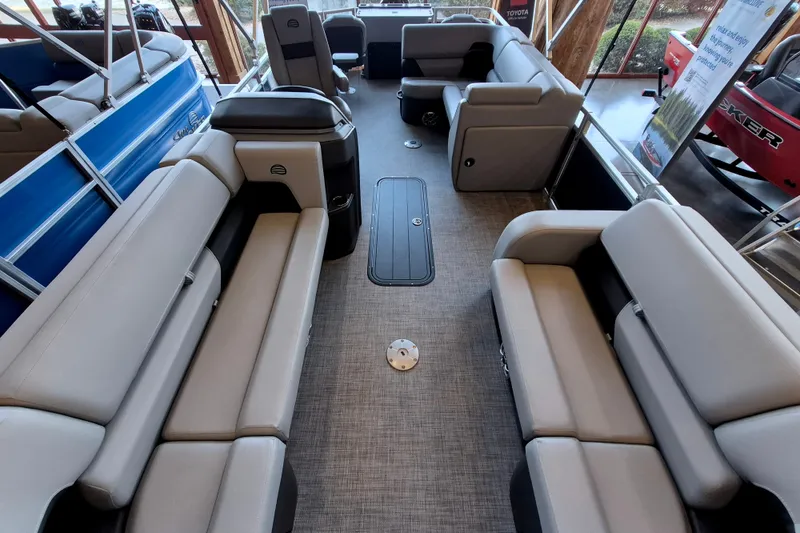 Slide: The Image of 2026 Sun Tracker SportFish 22 XP3 pontoon boat interior with spacious seating and modern design. - 13