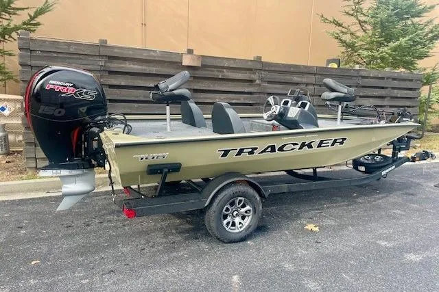 Slide: The Image of 2026 Tracker Pro Team 195 boat with Mercury Pro XS engine on trailer. - 2