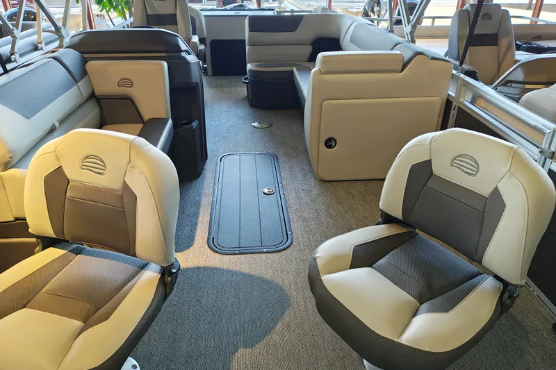 Slide: The Image of Interior of 2026 Sun Tracker Fishin' Barge 22 XP3 with comfortable seating. - 101