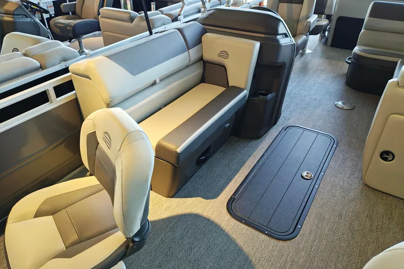 Slide: The Image of Interior of 2026 Sun Tracker Fishin' Barge 22 XP3, featuring comfortable seating and modern design. - 102
