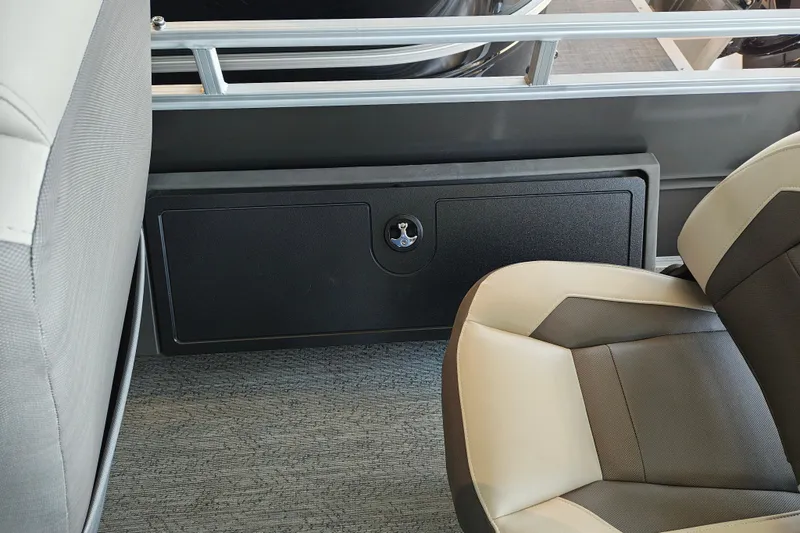 Slide: The Image of 2026 Sun Tracker Fishin' Barge 22 XP3 interior seating and storage compartment. - 107