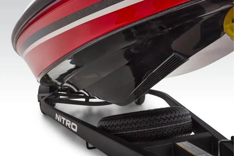 Slide: The Image of 2026 Nitro Z19 XL boat dashboard with steering wheel and control panel. - 10