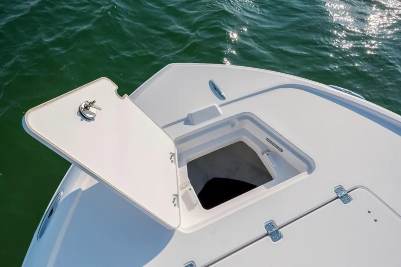 Slide: The Image of Open storage compartment on Caymas 26 HB boat, 2026 model. - 12