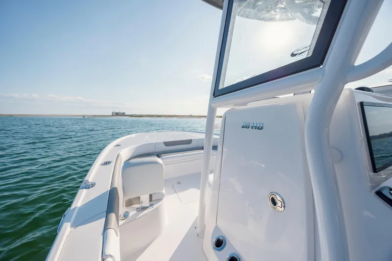 Slide: The Image of Caymas 26 HB boat on open water, year 2026. - 20