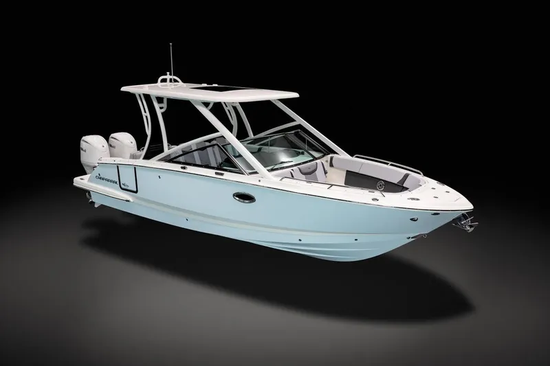 Slide: The Image of 2026 Chaparral 280 OSX boat seating area with sleek white and gray upholstery. - 14