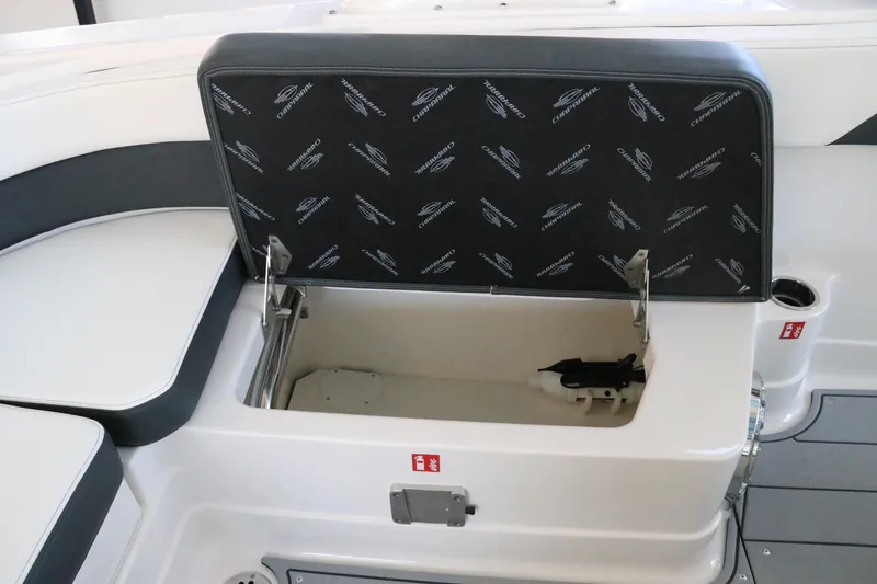 Slide: The Image of 2026 Chaparral 280 OSX boat interior with speaker and cup holder. - 20