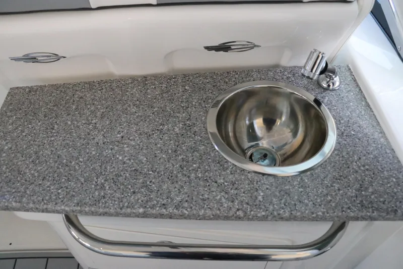 Slide: The Image of Open drawer refrigerator on 2026 Chaparral 280 OSX boat, featuring Isotherm design. - 24