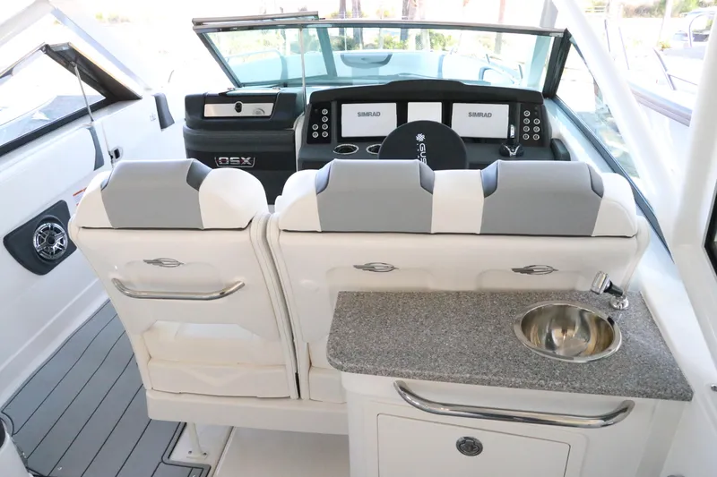 Slide: The Image of Dashboard of 2026 Chaparral 280 OSX boat with modern controls and displays. - 27