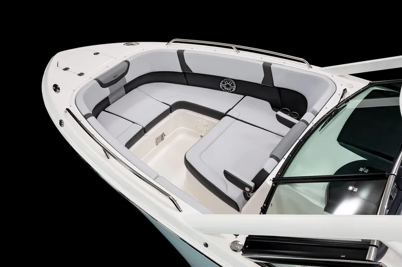 Slide: The Image of 2026 Chaparral 280 OSX boat with sleek design and modern features in a showroom. - 3
