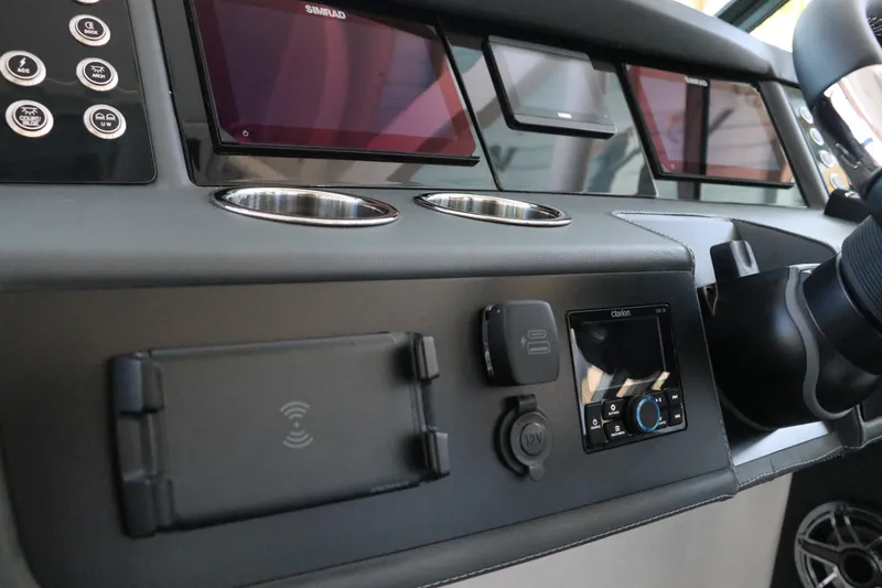 Slide: The Image of Control panel of 2026 Chaparral 280 OSX boat with joystick and buttons. - 30