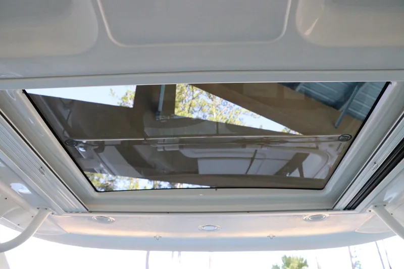 Slide: The Image of Ceiling view of 2026 Chaparral 280 OSX boat with sleek design and integrated lighting. - 34