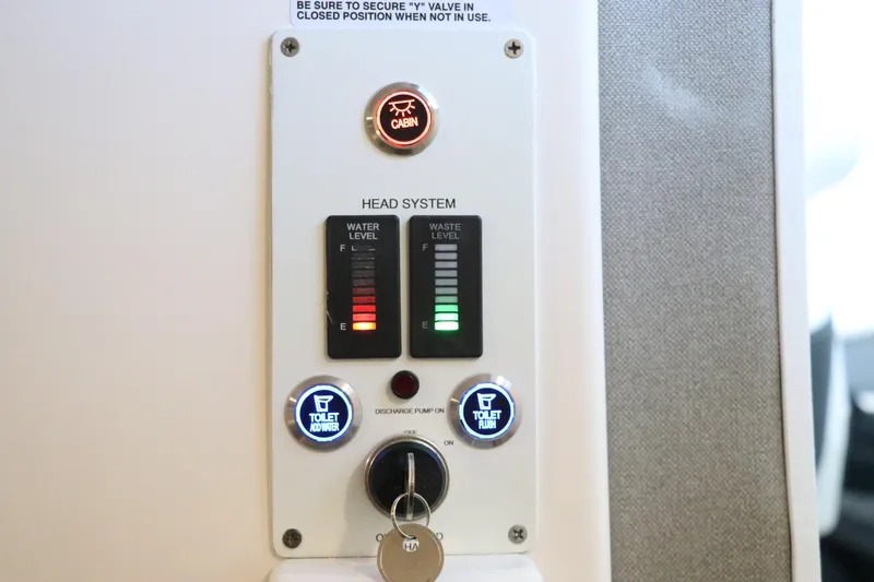 Slide: The Image of 2026 Chaparral 280 OSX boat interior with cushioned seating and cup holders. - 50