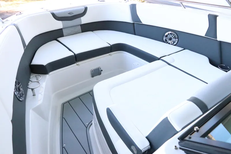 Slide: The Image of Luxurious seating on 2026 Chaparral 280 OSX boat with sleek white and gray design. - 52