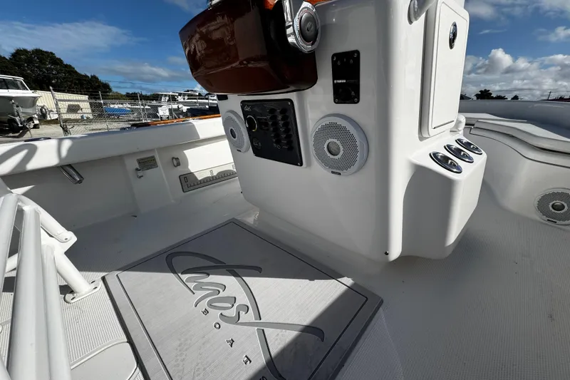 Slide: The Image of 2018 Chaos 21 Tarpon Bay boat with white seating and modern design. - 25