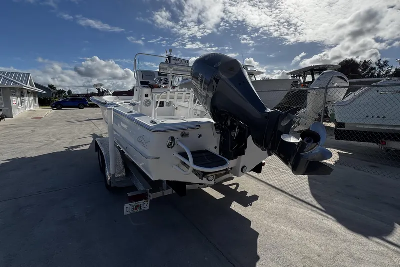Slide: The Image of 2018 Chaos 21 Tarpon Bay boat with Yamaha outboard engine on trailer. - 4