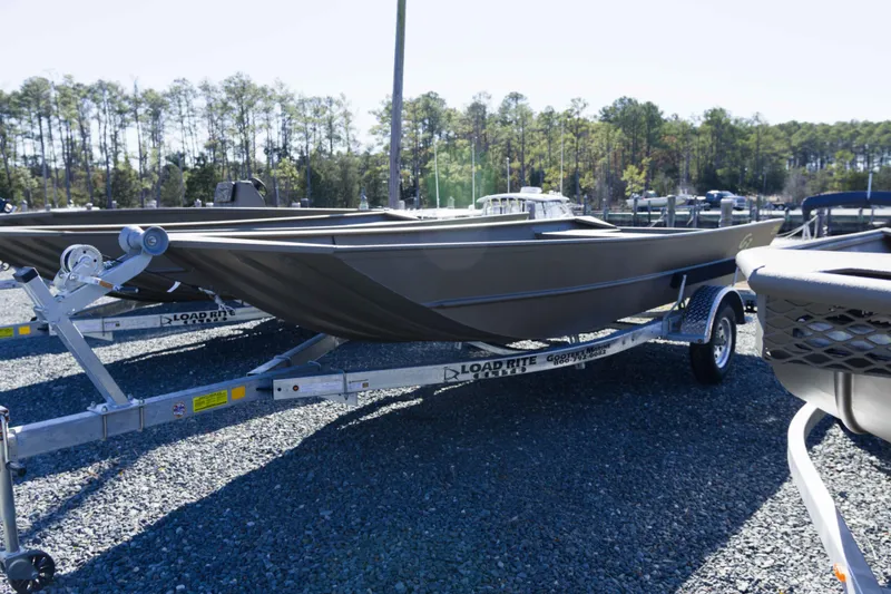 Slide: The Image of 2026 G3 Gator Tough 1860 VBW boat on trailer in outdoor setting. - 3