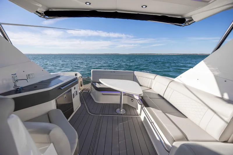 Slide: The Image of Luxurious 2020 Sea Ray Sundancer 320 Outboard yacht interior with ocean view. - 18