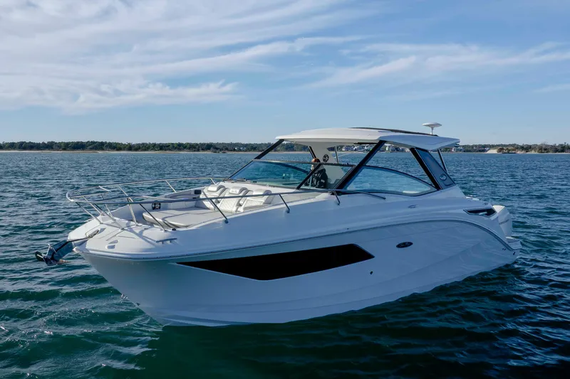 Slide: The Image of 2020 Sea Ray Sundancer 320 Outboard cruising on a sunny day. - 2