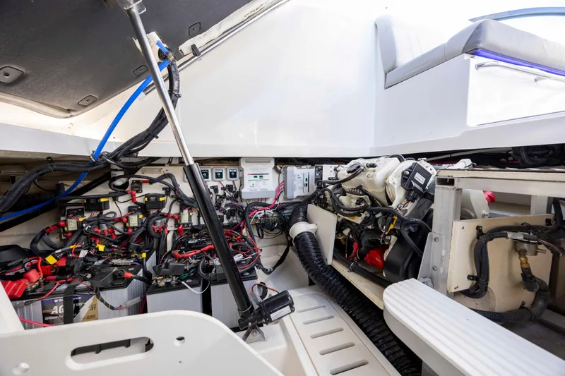 Slide: The Image of 2020 Sea Ray Sundancer 320 Outboard engine compartment with wiring and components. - 26