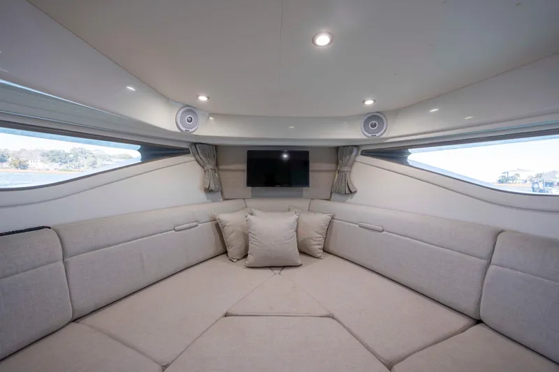 Slide: The Image of 2020 Sea Ray Sundancer 320 Outboard interior with plush seating and modern amenities. - 36