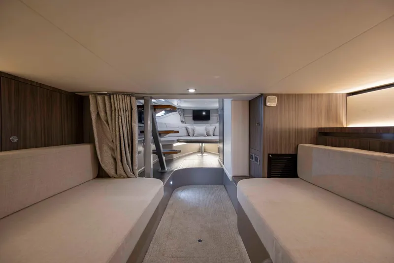 Slide: The Image of Interior of 2020 Sea Ray Sundancer 320 Outboard, featuring cozy seating and modern design. - 42