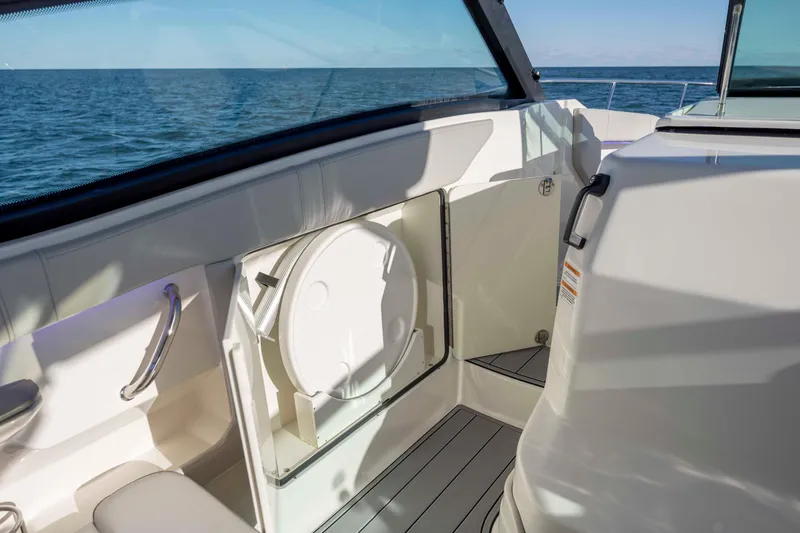 Slide: The Image of 2020 Sea Ray Sundancer 320 Outboard interior with ocean view, featuring sleek design and modern amenities. - 47