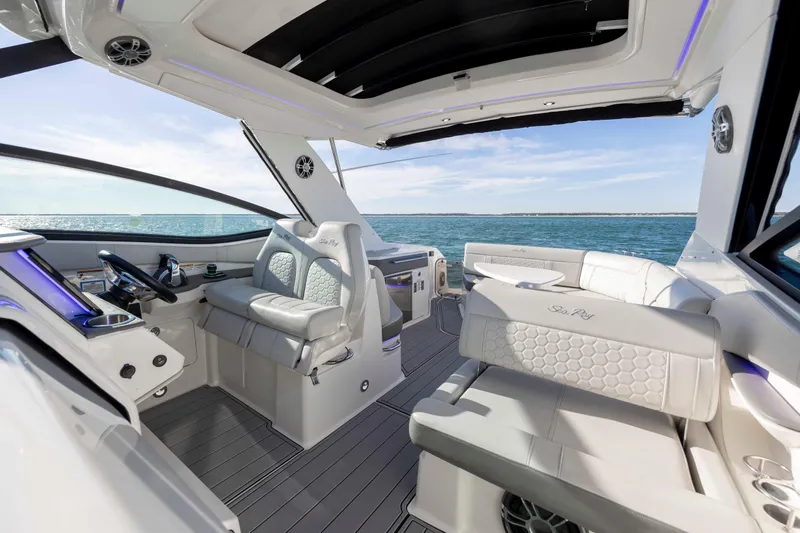 Slide: The Image of 2020 Sea Ray Sundancer 320 Outboard interior with luxurious seating and ocean view. - 49