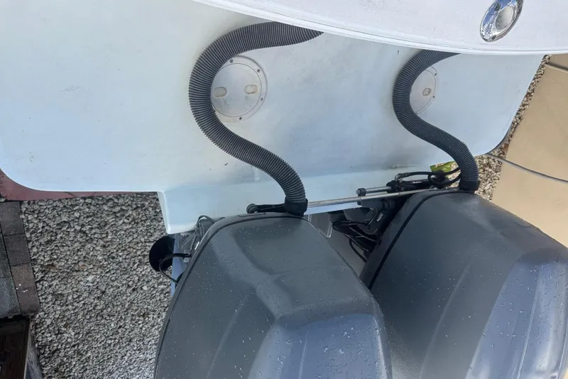 Slide: The Image of 1962 Bertram 25 Moppie boat with dual outboard motors, top view. - 8