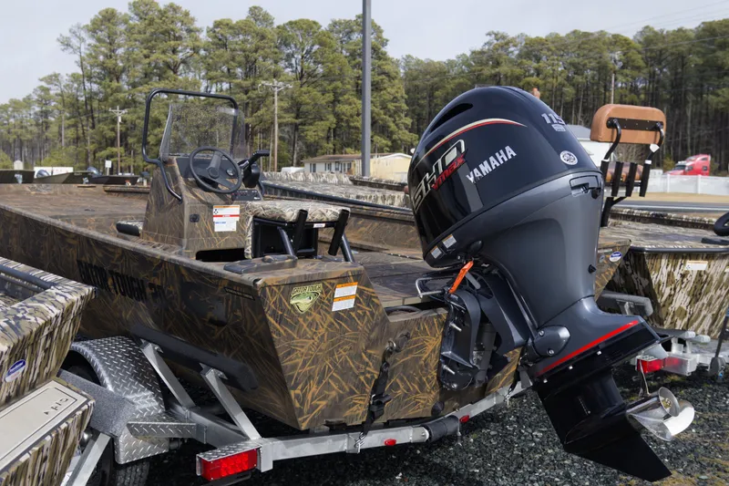 Slide: The Image of 2026 G3 Gator Tough 20 CC boat with Yamaha outboard motor, camo design. - 2