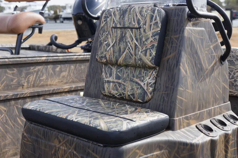 Slide: The Image of 2026 G3 Gator Tough 20 CC boat with camouflage seating and console design. - 8