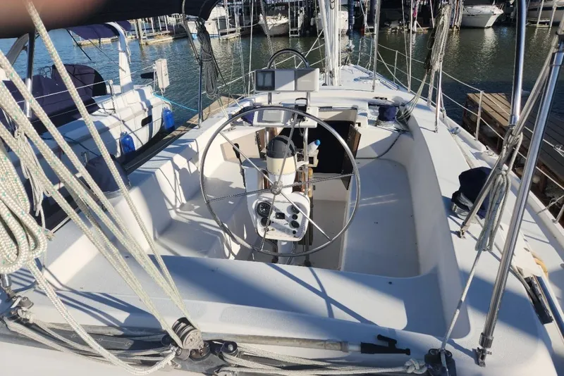 The Image of Cockpit of 1993 Catalina Morgan 381 sailboat docked at marina. - 0