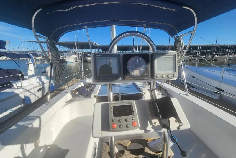 Slide: The Image of Cockpit view of 1993 Catalina Morgan 381 sailboat with navigation instruments. - 2