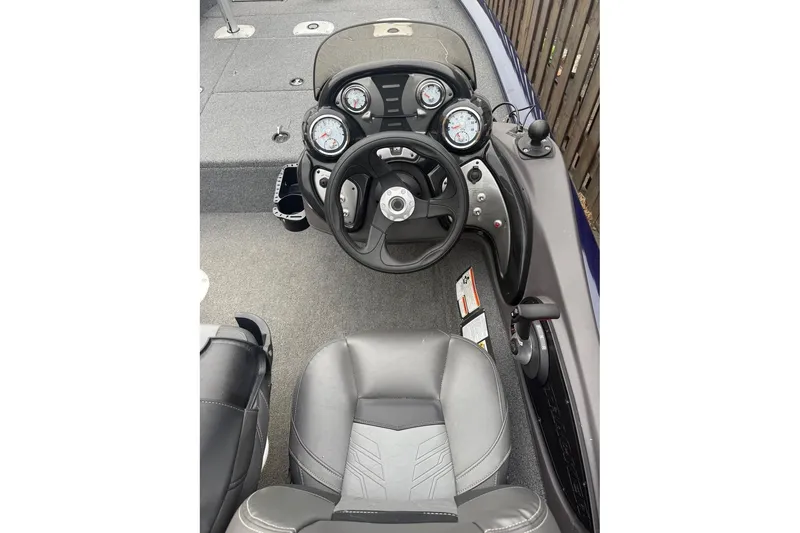 Slide: The Image of 2020 Tracker Pro Team 175 TF boat cockpit with steering wheel and gauges. - 3