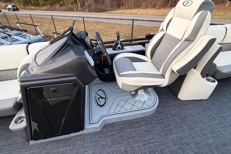 Slide: The Image of Captain's chair and console of 2026 Veranda VR 265 RCP pontoon boat. - 12