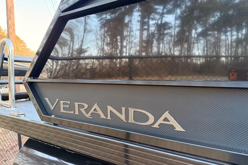 Slide: The Image of 2026 Veranda VR 265 RCP boat with sleek design and metallic finish. - 4