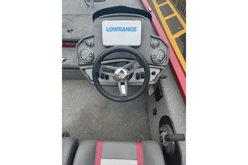 Slide: The Image of 2021 Ranger RT178 boat dashboard with Lowrance display and steering wheel. - 3