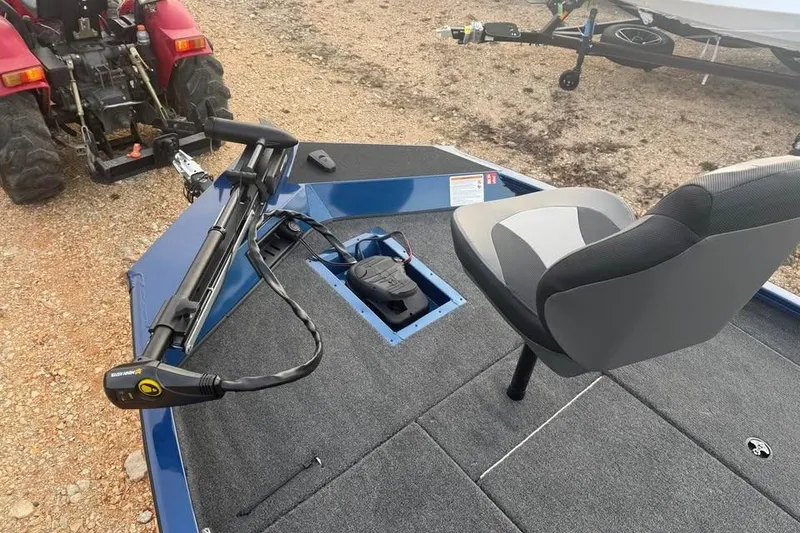 Slide: The Image of 2026 Lowe Stinger 195 Bass boat deck with seat and trolling motor. - 12