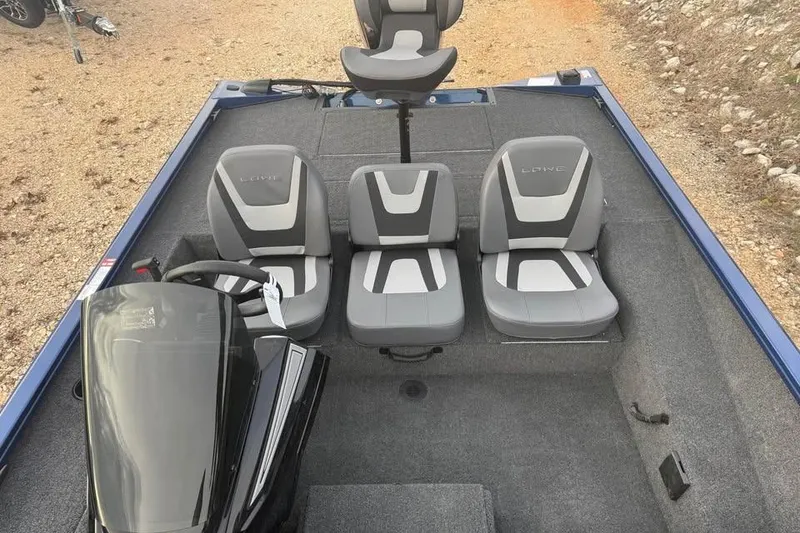 Slide: The Image of 2026 Lowe Stinger 195 Bass boat interior with three gray seats and steering console. - 15