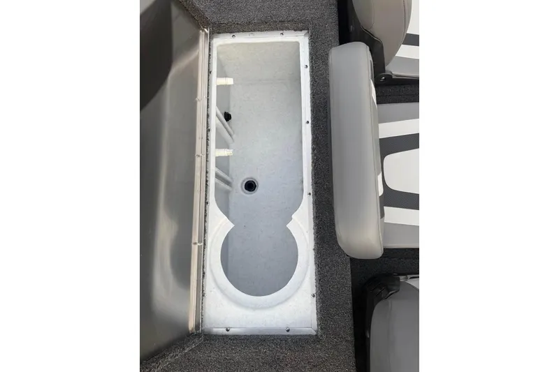 Slide: The Image of 2026 Lowe Stinger 195 Bass boat interior storage compartment. - 16