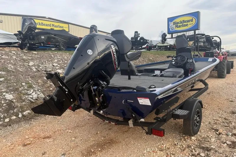 Slide: The Image of 2026 Lowe Stinger 195 Bass boat with Mercury engine at BlackBeard Marine dealership. - 6